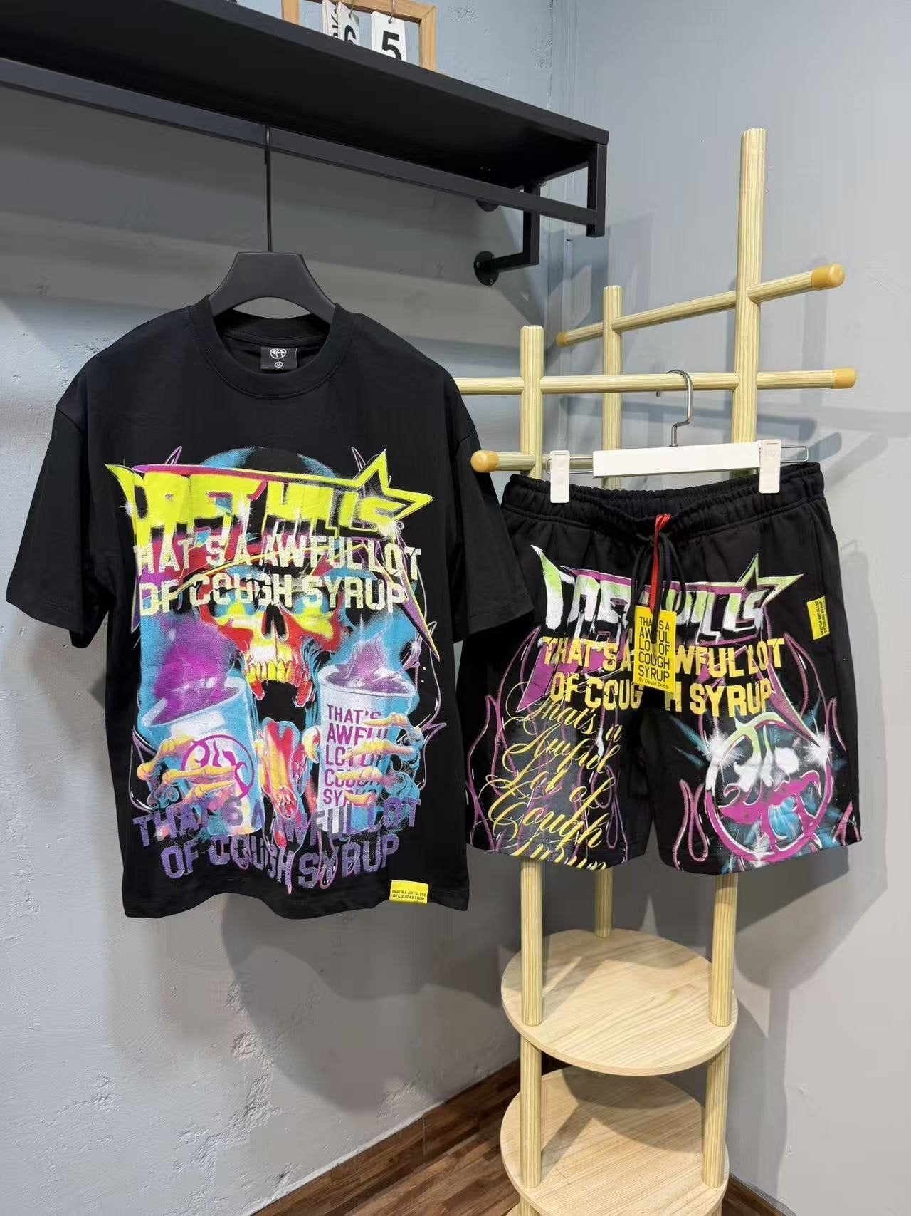THAT'S A AWFUL LOT OF COUGH SYRUP Colorful Bottle Graphic Short-Sleeve Set — front